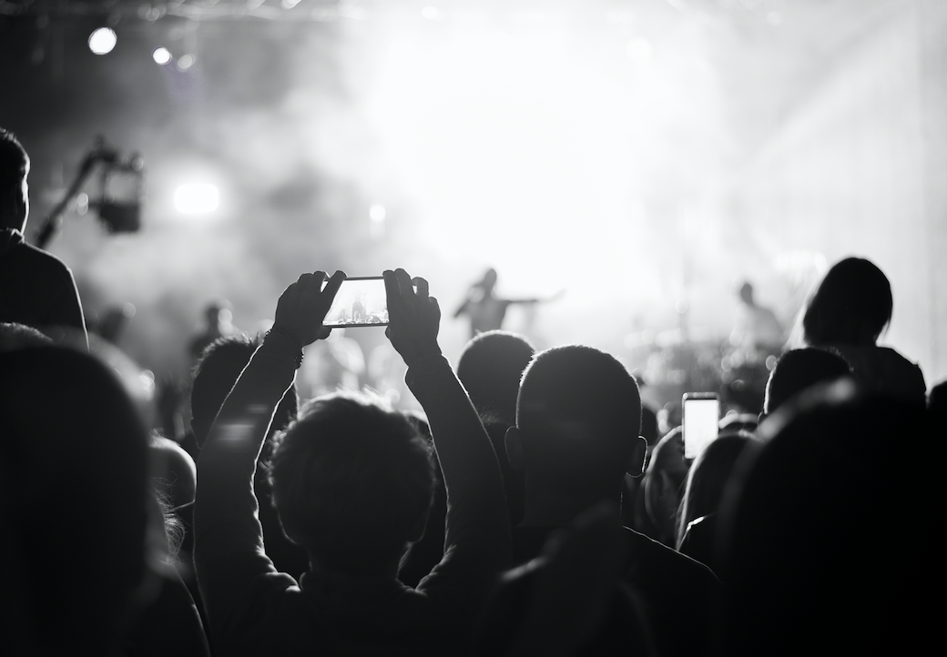 loud concert crowd black white phone