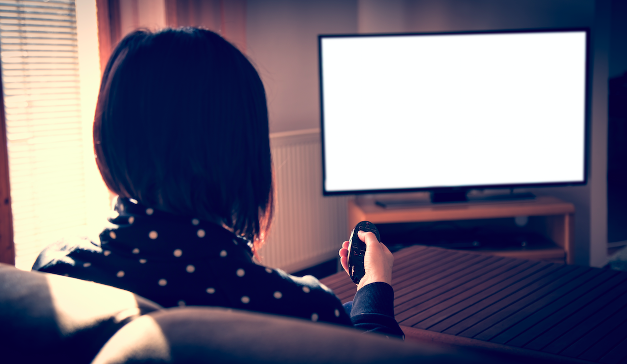 woman watches tv home relax screen